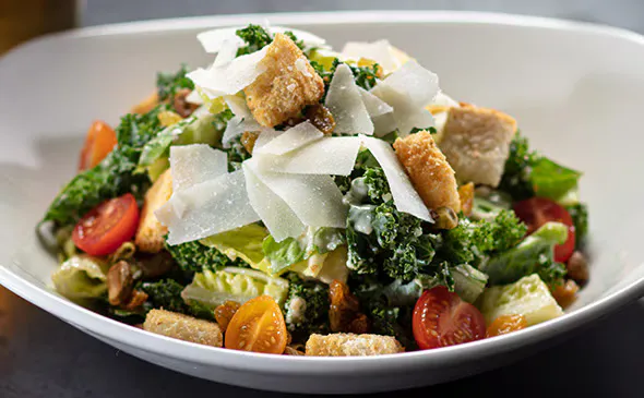 KALE & ROMAINE CAESARRS